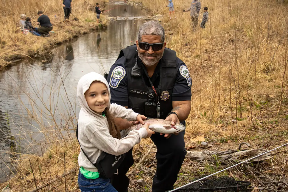Child trout fishing