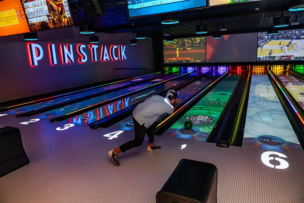 a person bowling at Pinstack