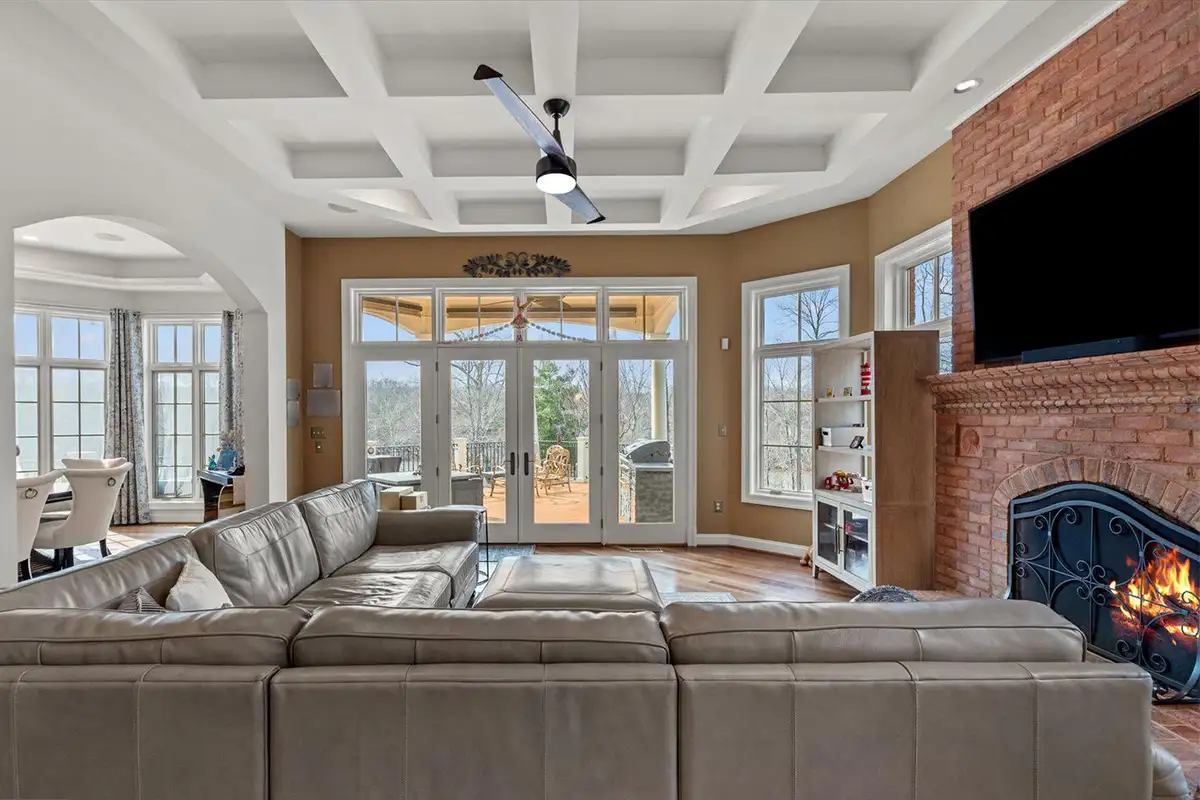 Family room with brick fireplace of Lake Occoquan Dr