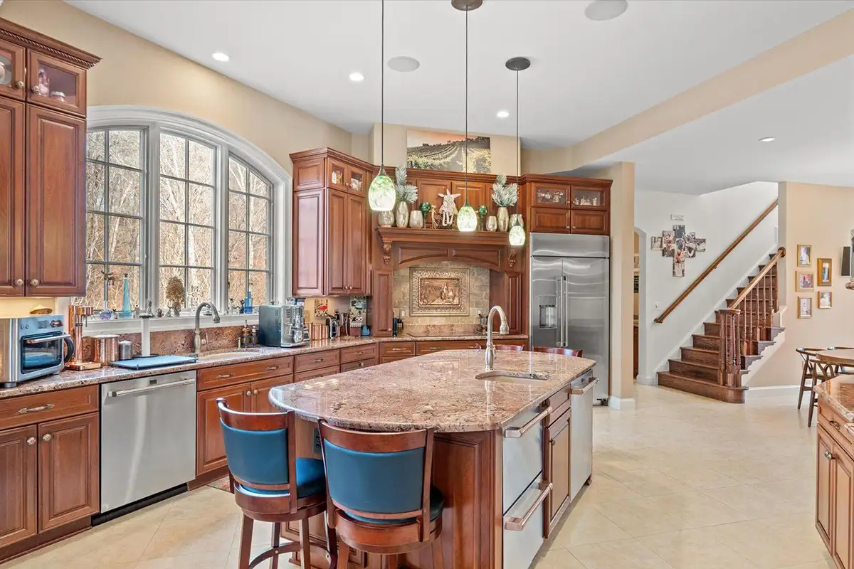 Kitchen with large sink window and island of 10036 Lake Occoquan Dr