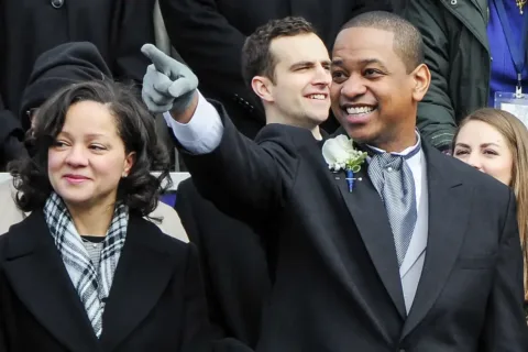 Governover Ralph S. Northam, far-right, and Lieutenant Governor Justin E. Fairfax wave to the crowd during the inauguration of Dr. Northam as the 73rd Governor of Virginia Jan. 13, 2018, in Richmond, Virginia. (U.S. Air National Guard photo by Senior Airman Kellyann Novak)