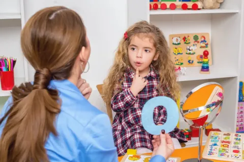 Child working with speech pathologist