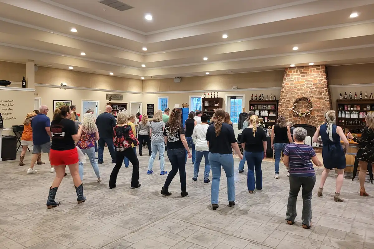 People line dancing at Effingham Manor