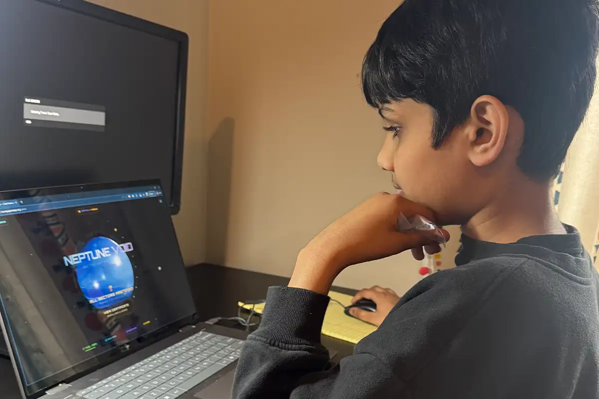  Nikhil Nidamarthi (6th grader, Evergreen MS) playing Money Quest. 