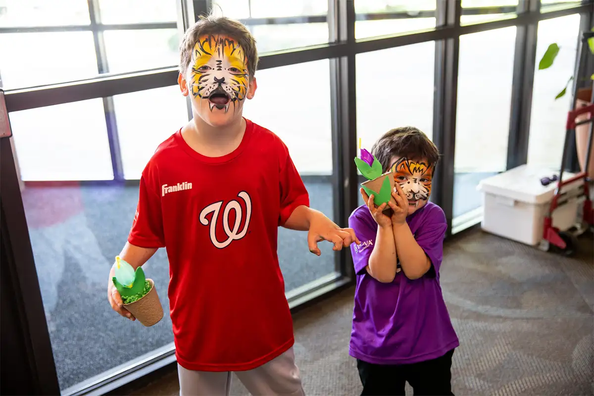 Two boys with faces painted