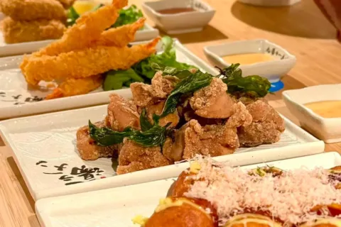 food on plates at Kyuramen in Herndon