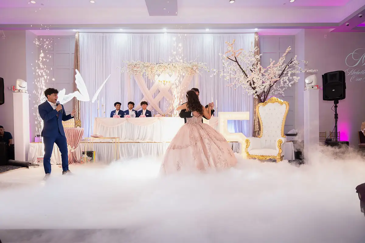 Girl and her father dancing at quinceañera