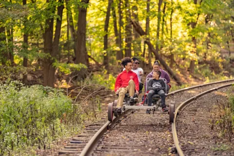 Family rail biking at Tracks and Yaks in Maryland