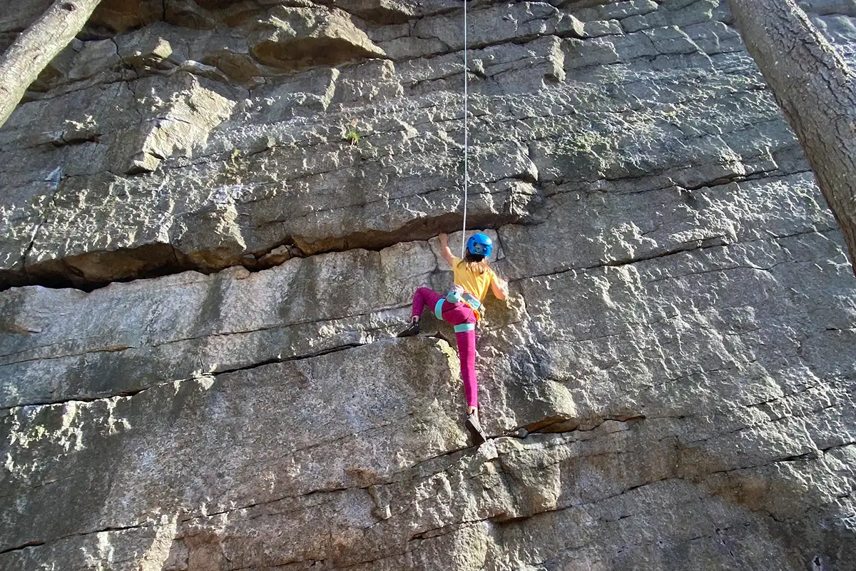 Girl rock climbing at New York's Shawangunk Ridge