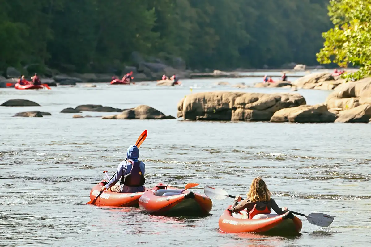 People kayaking with Wilderness Voyageurs on Pennsylvania's Youghiogheny River