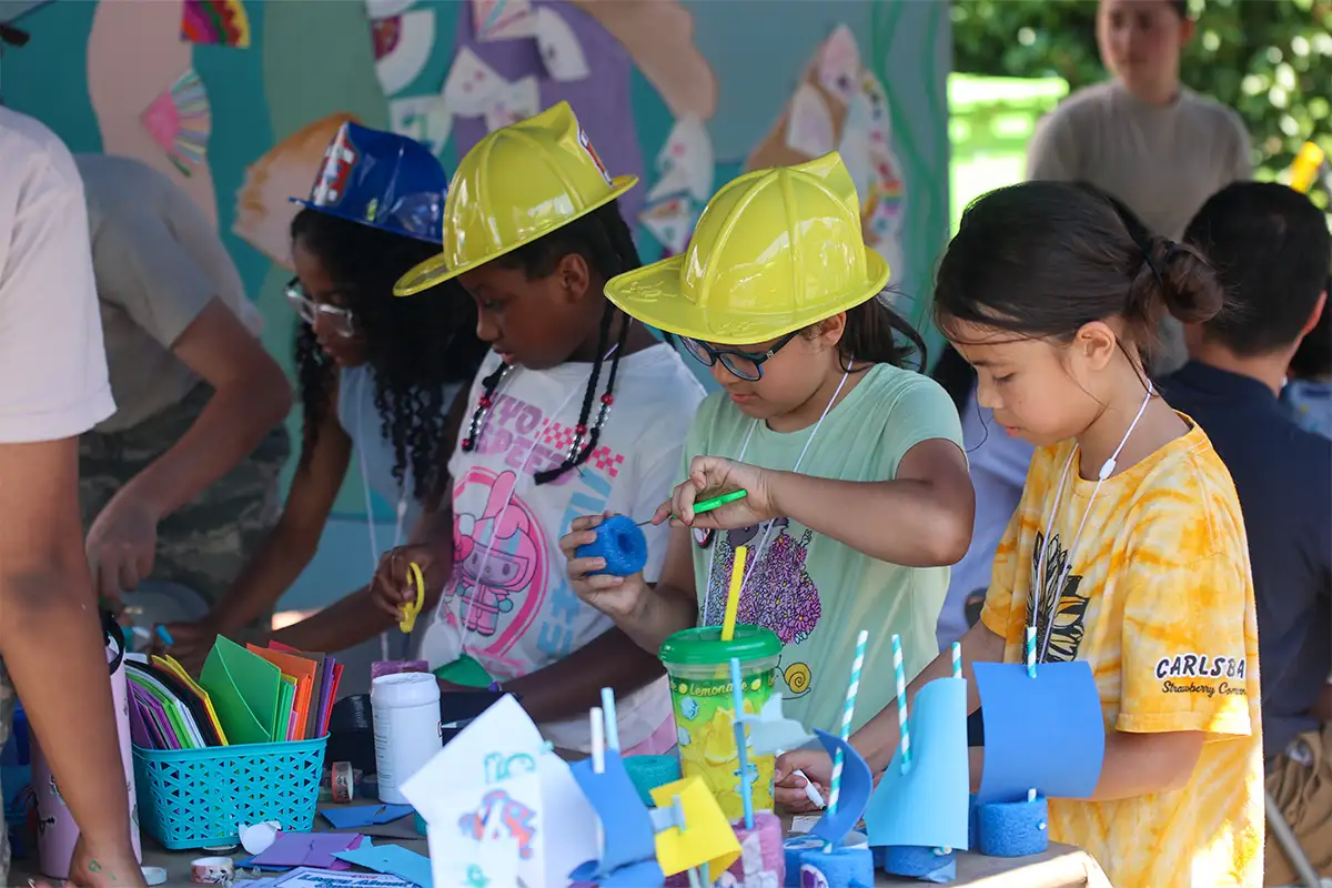 Girls doing arts and crafts at Occoquan RiverFest and Craft Show