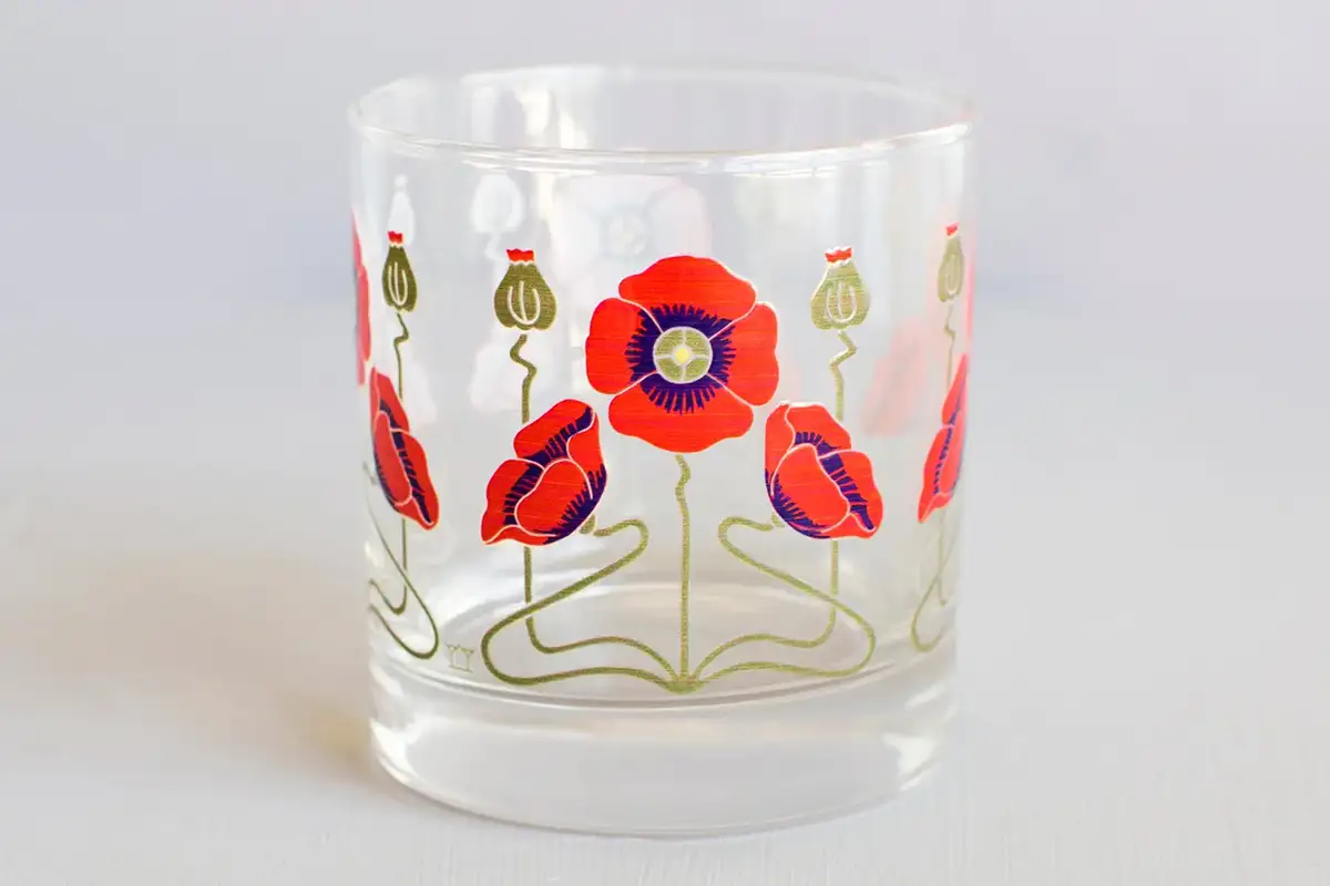 Red poppy rocks glass