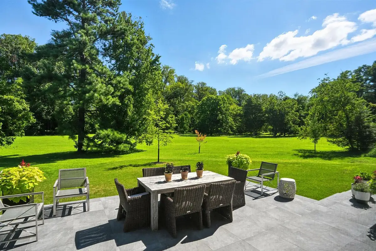 Outdoor patio with seating area of 1200 Jossie Lane.
