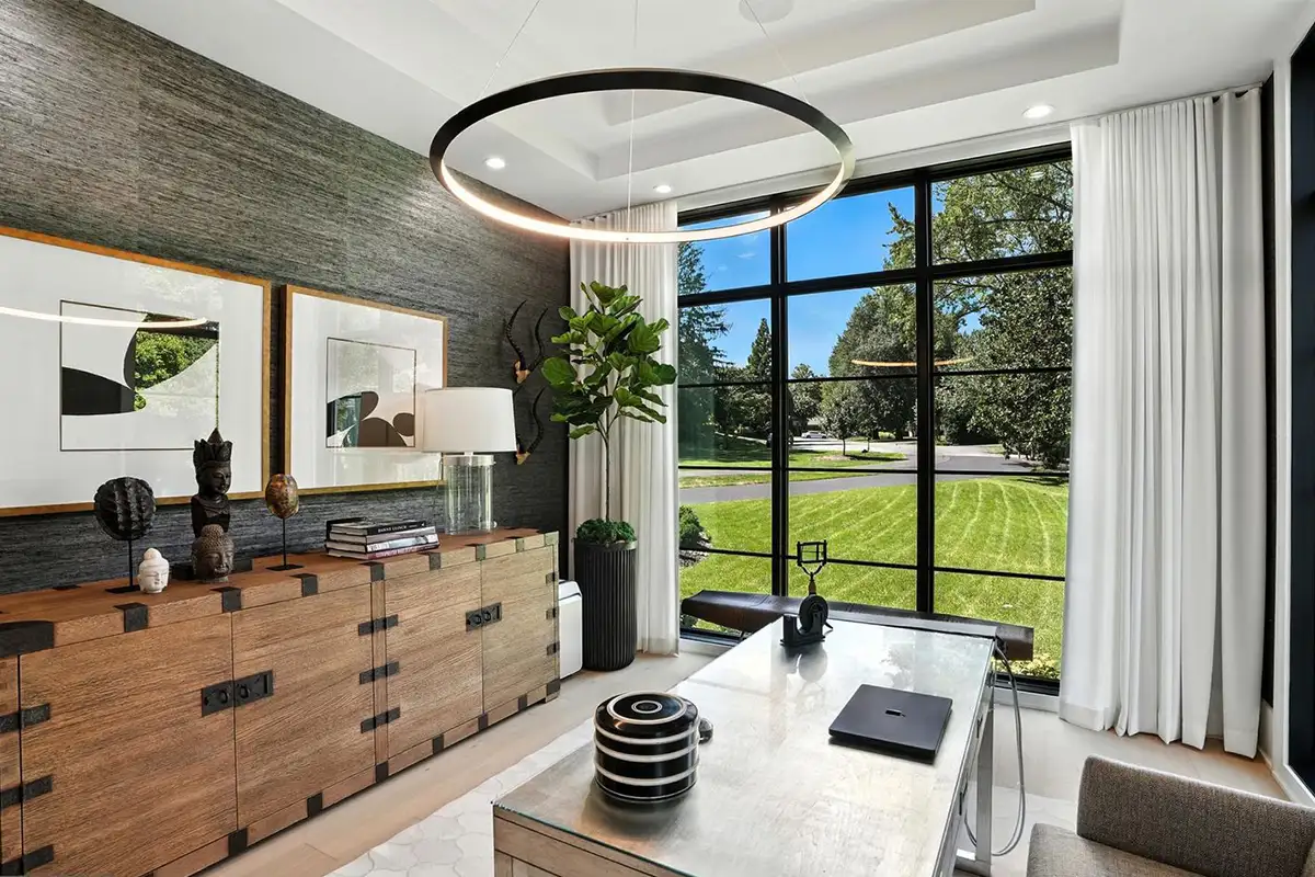 Office with floor to ceiling windows and modern fixtures of 1200 Jossie Lane.