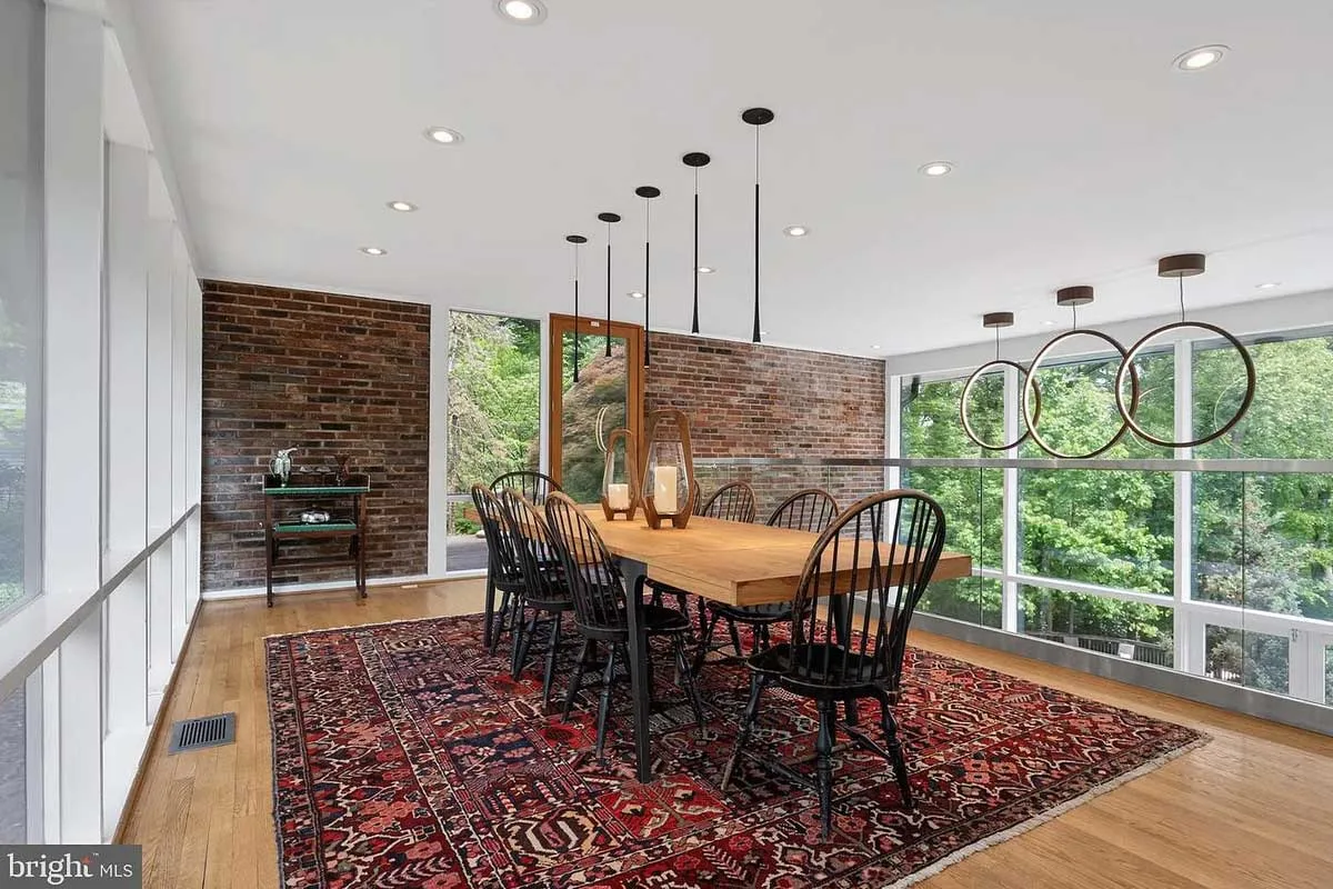 dining room surrounded by glass walls