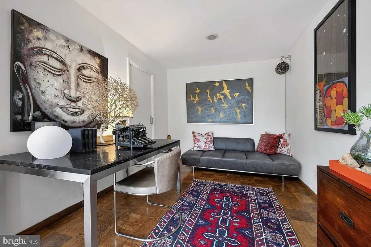 private office with wood flooring