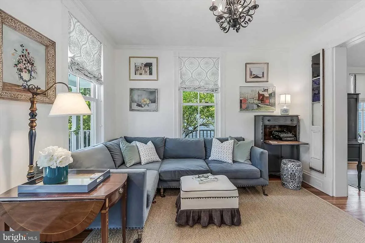 living room with blue sectional couch