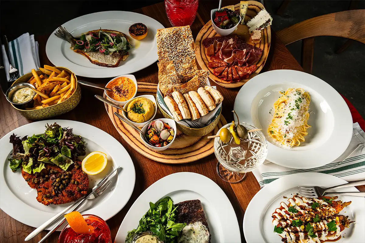 Multiple menu items on a table at Cafe Monet