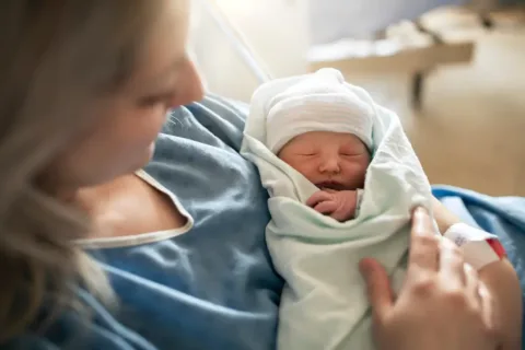 Mother with newborn baby