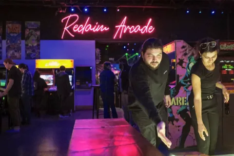 people play games at Reclaim Arcade