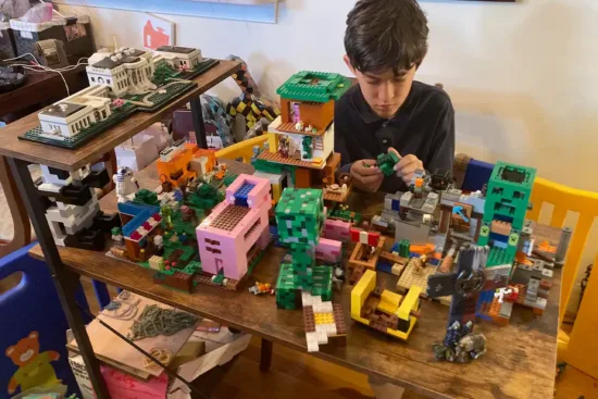 William Ubben plays with Legos