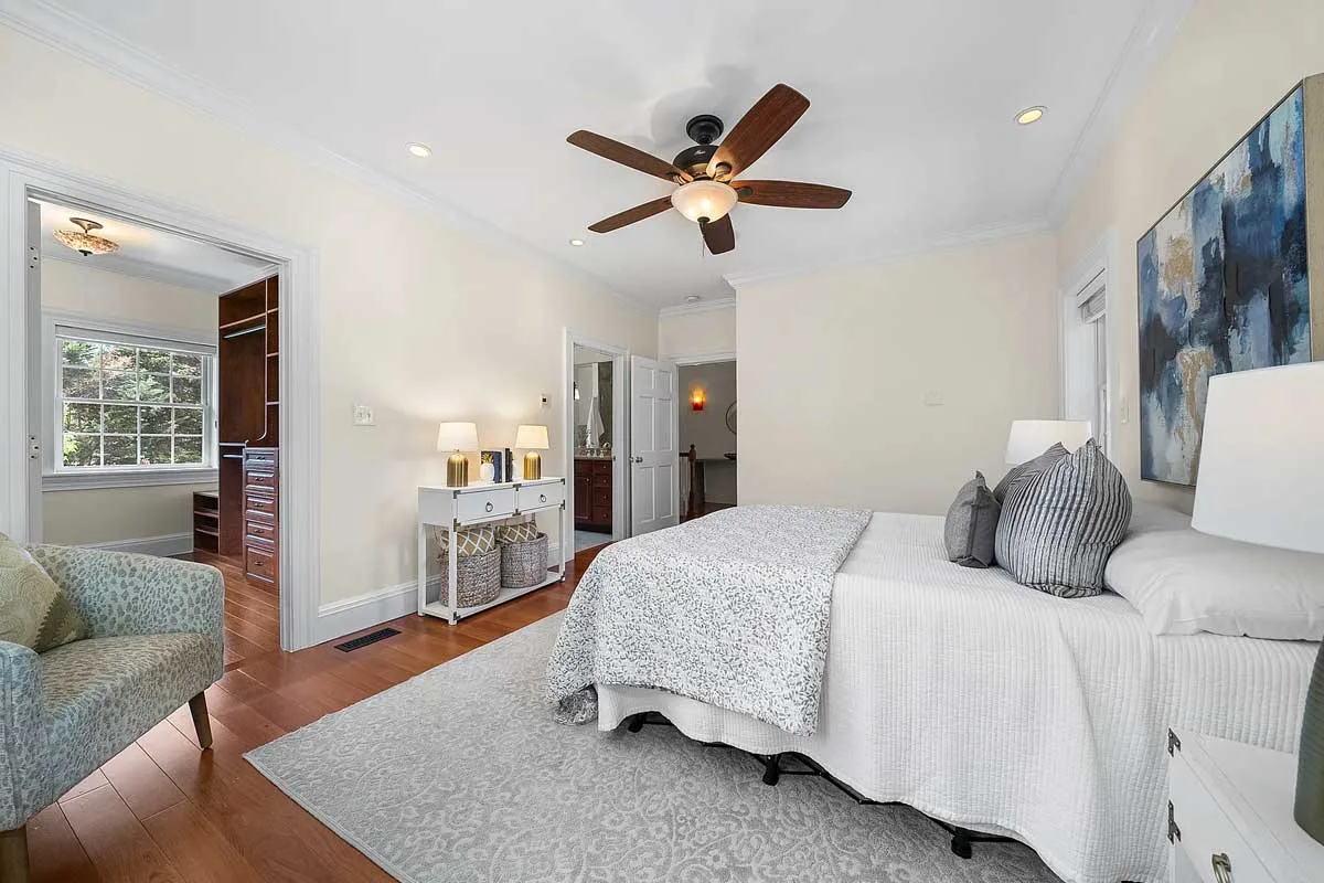primary bedroom with walk-in closet