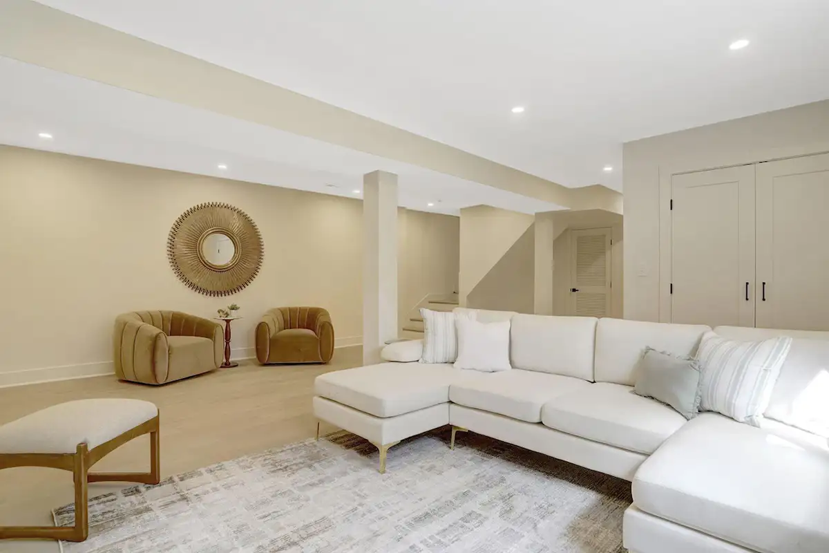 Finished basement with bedroom, bathroom, living area, and fireplace of 3504 Gordon St