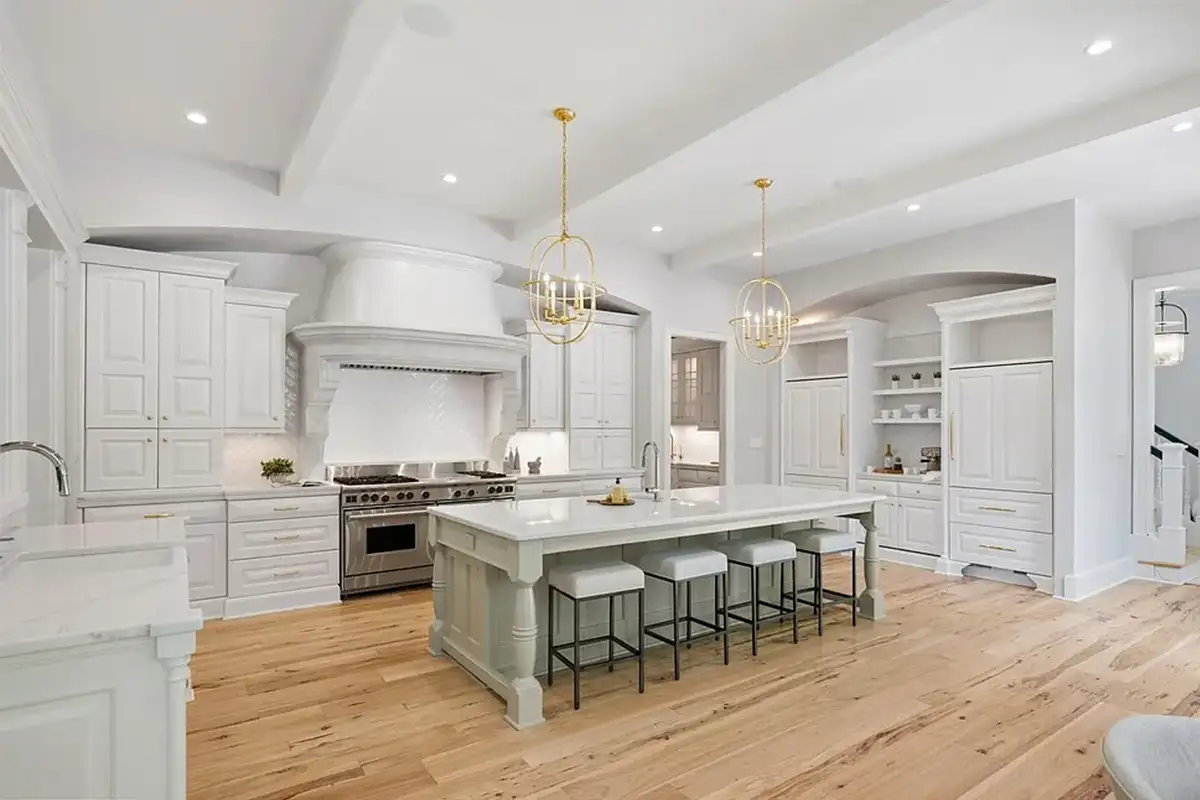 Kitchen with butler's pantry, walk-in pantry, breakfast alcove, and farm style island of 4614 36th St N