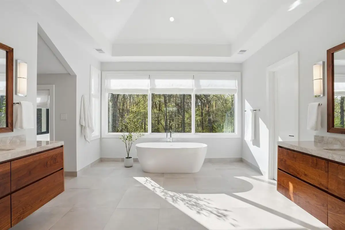 En-suite bathroom with steam shower, soaking tub, dual walnut vanities, and three walk-in closets of 938 Saigon Rd
