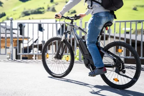 Man riding e-bike