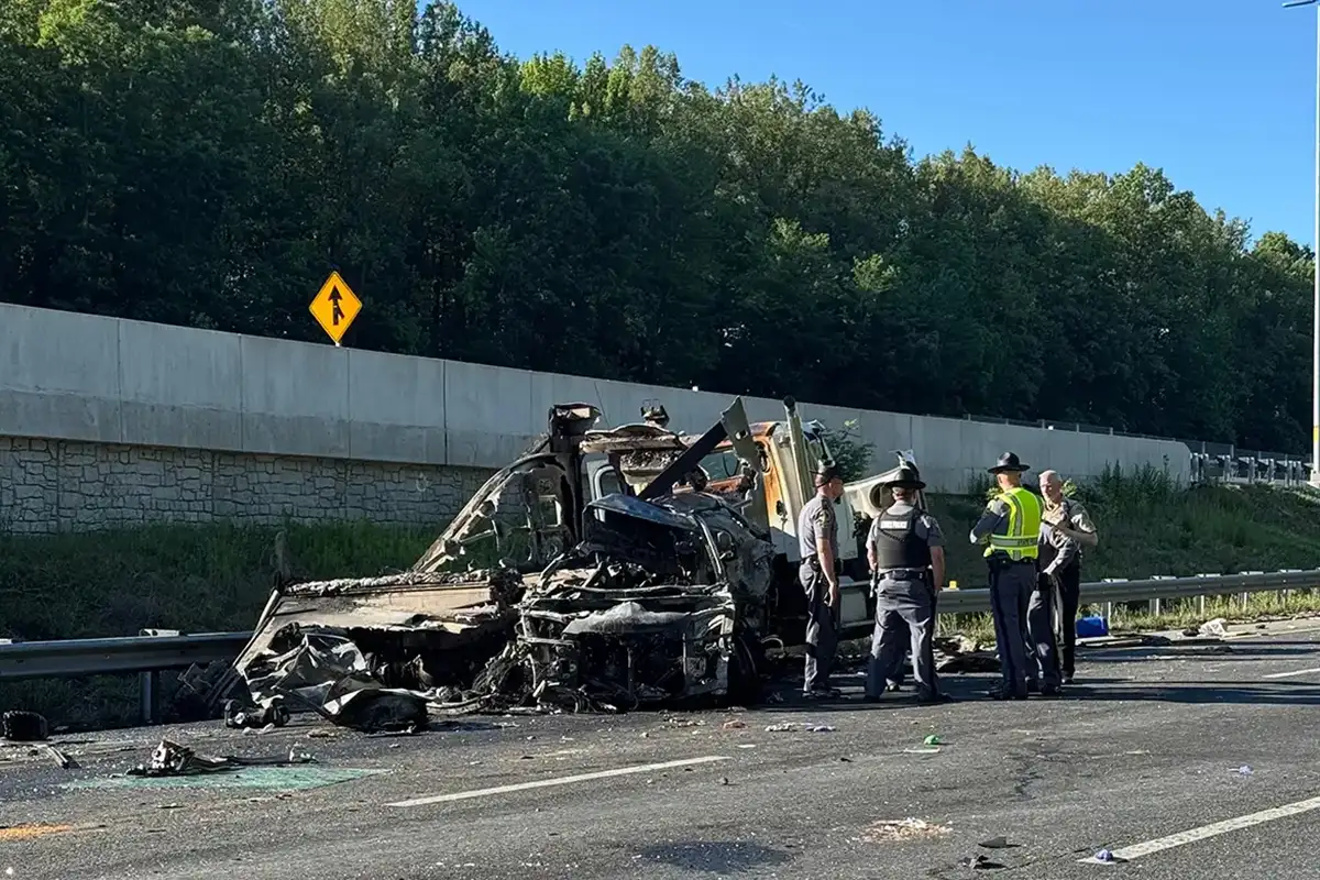 police stand near the scene of a fatal bus crash on I-95 near Stafford