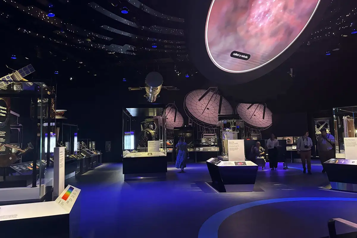 Display cases and projected films in new U.S. National Science Foundation Discovering Our Universe exhibit at Smithsonian Air and Space Museum