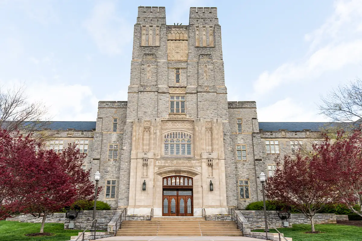 Historic Virginia Tech Polytechnic Institute and State University College campus with Burruss hall facade exterior in spring