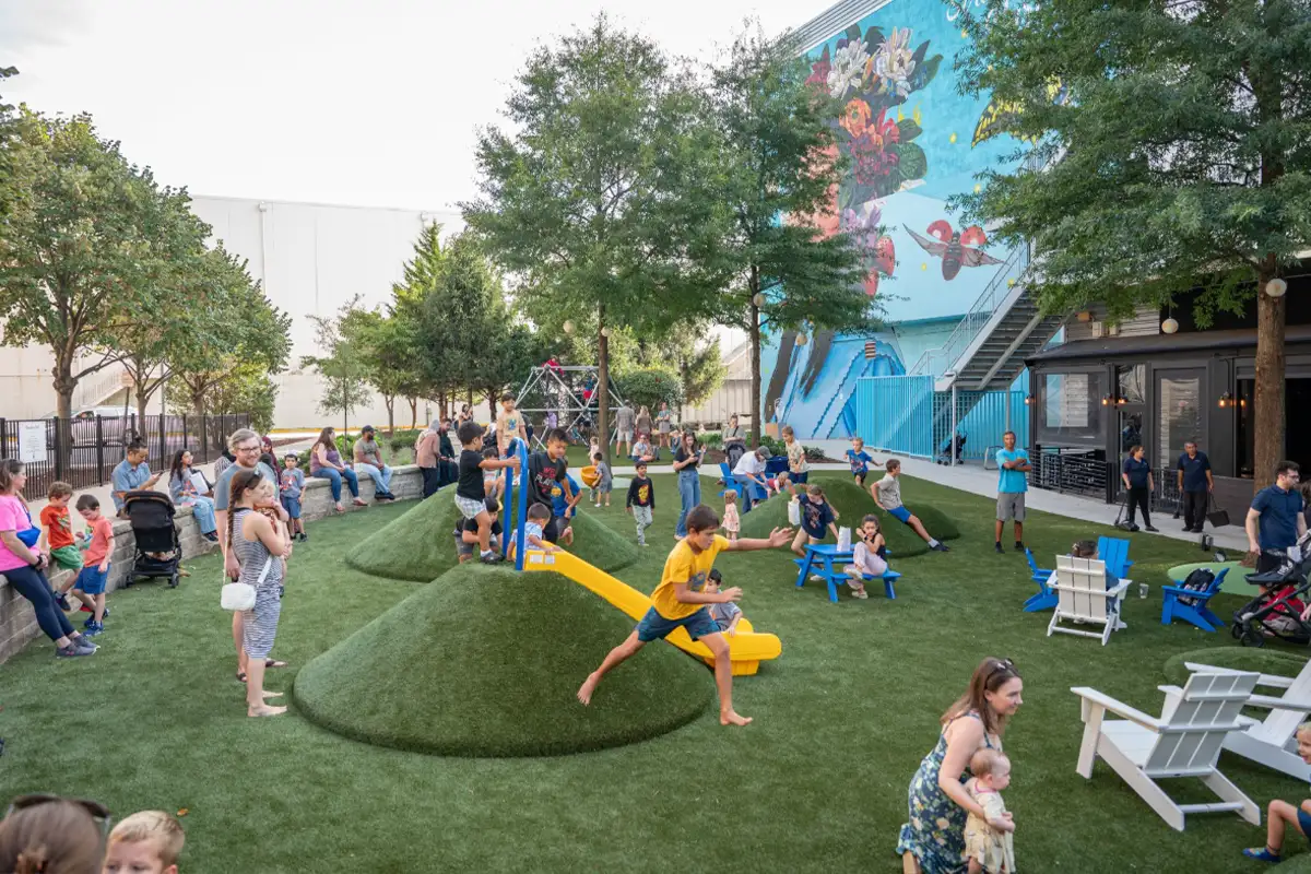 Kids play at Strawberry Park Playground in Mosaic