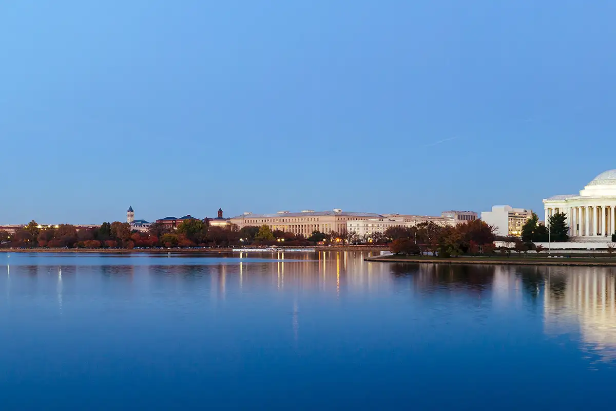 an image of Washington DC from across the Potomac River showing the Washington Monuments and Lincoln Memorial