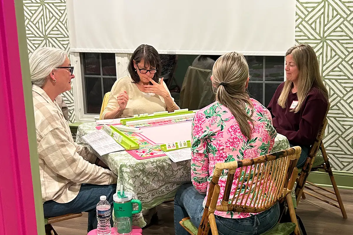Group of women playing mahjong