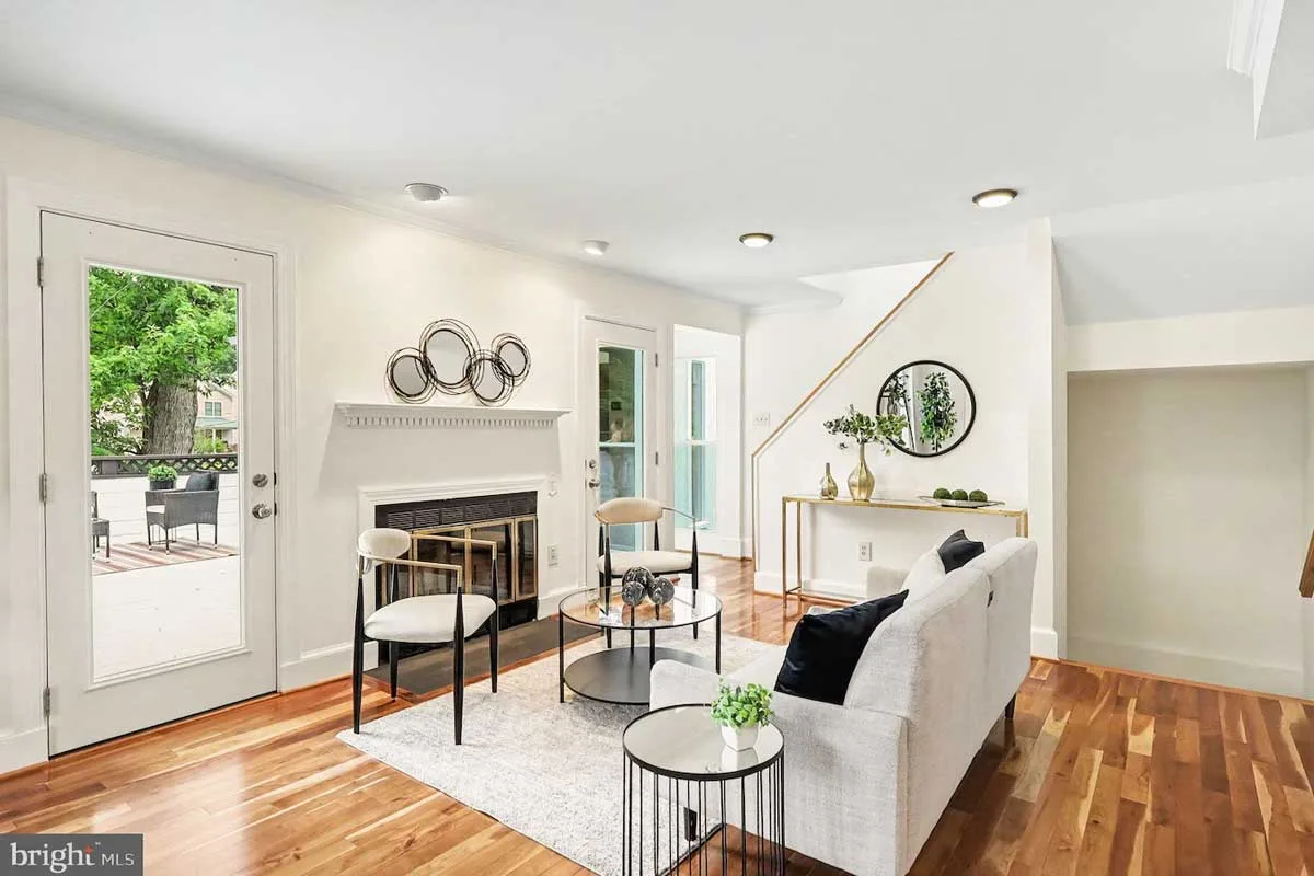 living room with hardwood floors and fireplace