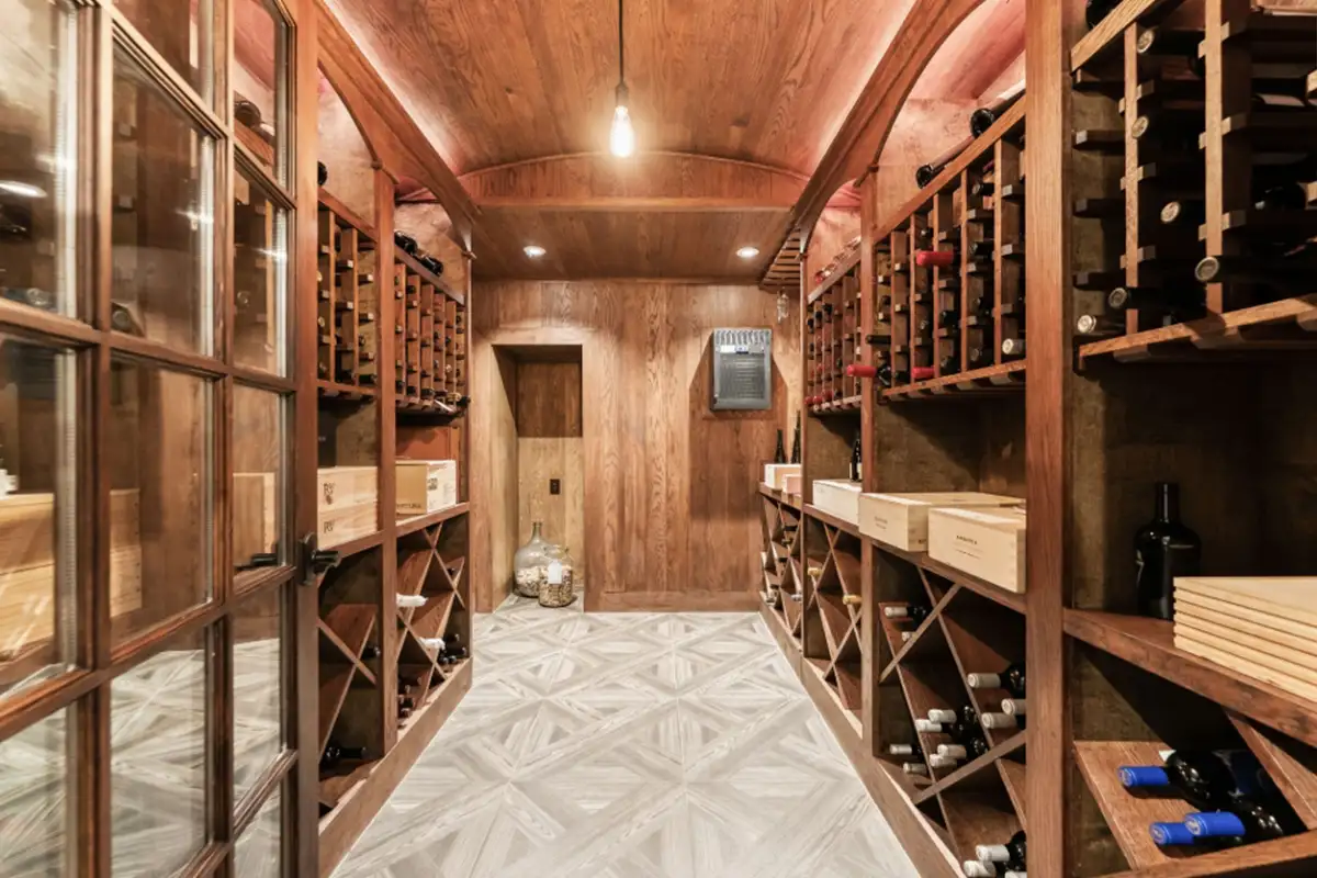 Wine cellar with temperature control and all wooden features of 22364 Wilson Meadows Ln