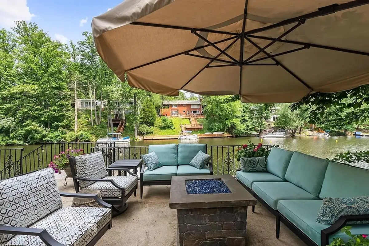 Outdoor patio overlooking the lake with wrought iron fencing