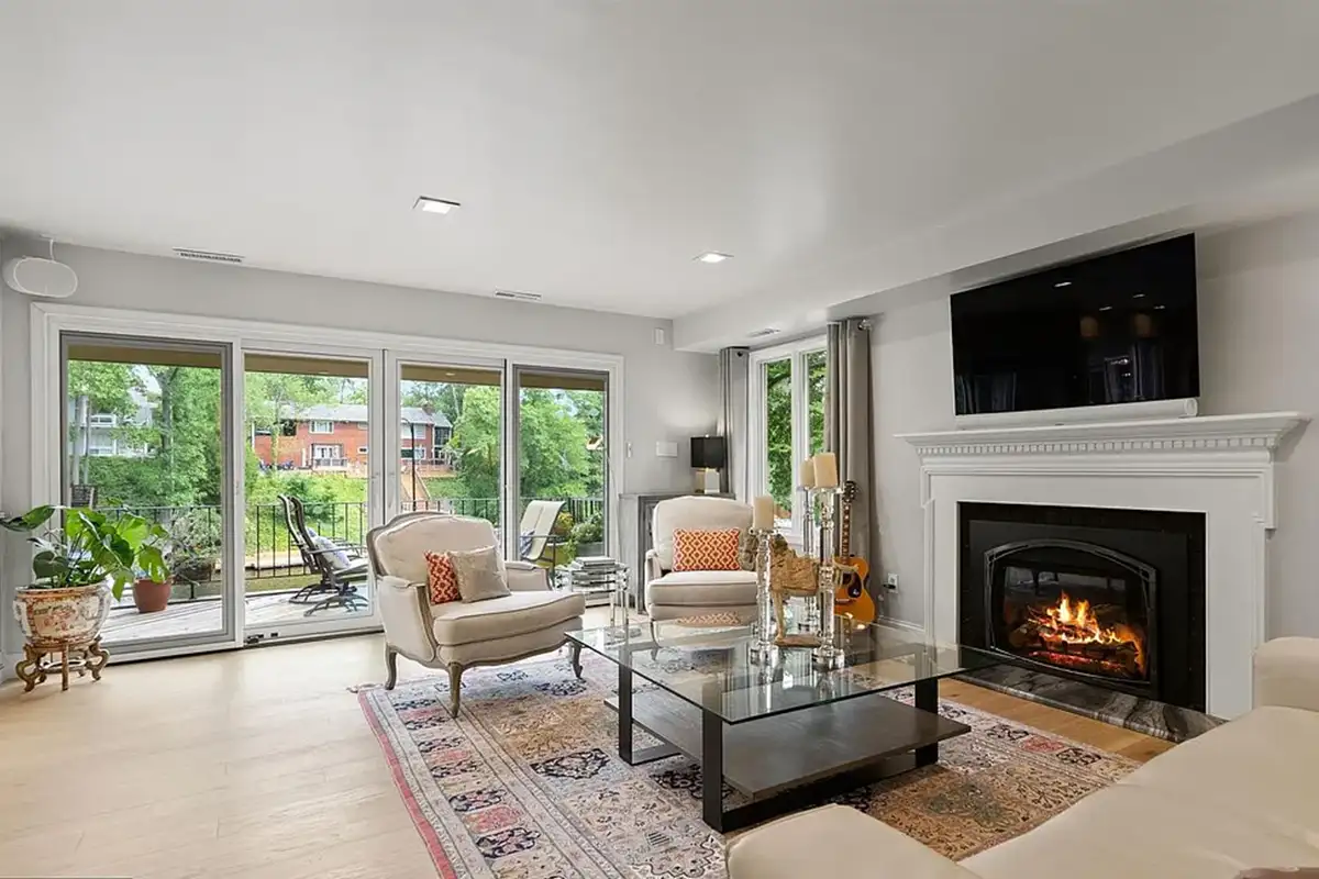 Family room with fireplace and sliding doors to terrace