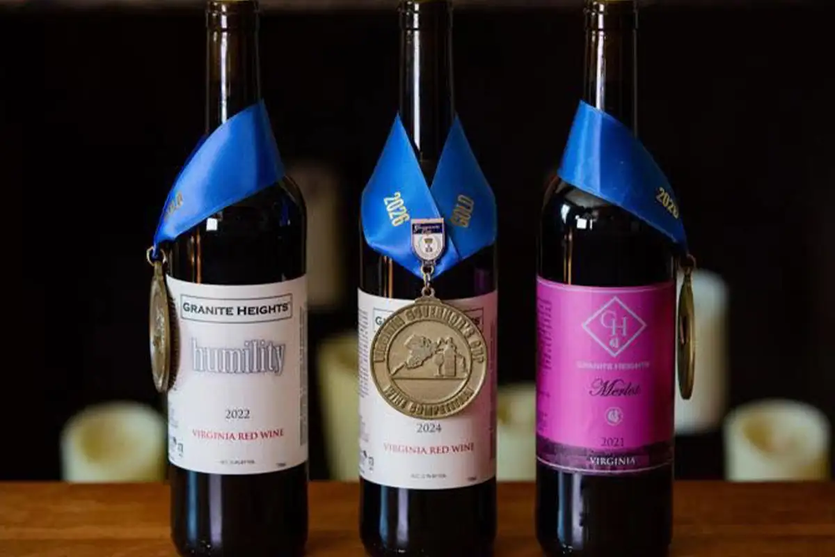 3 bottles of wine with blue ribbon medals from Granite Heights Winery