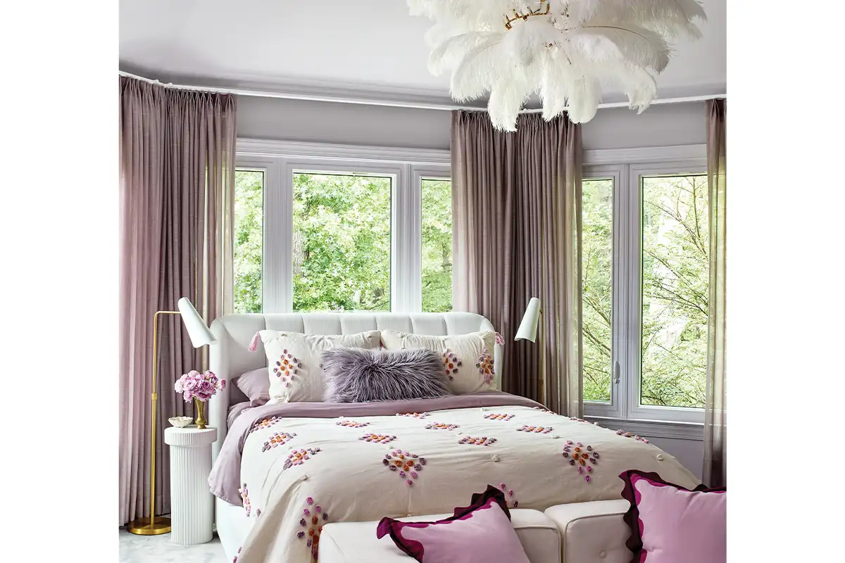 Kids' room with purple bedding and drapes