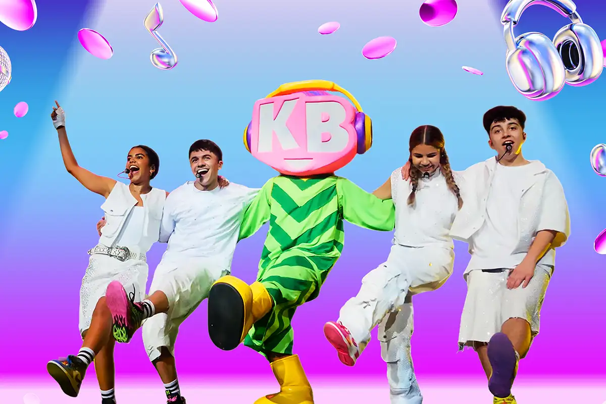 Kidz Bop kids and mascot singing and dancing