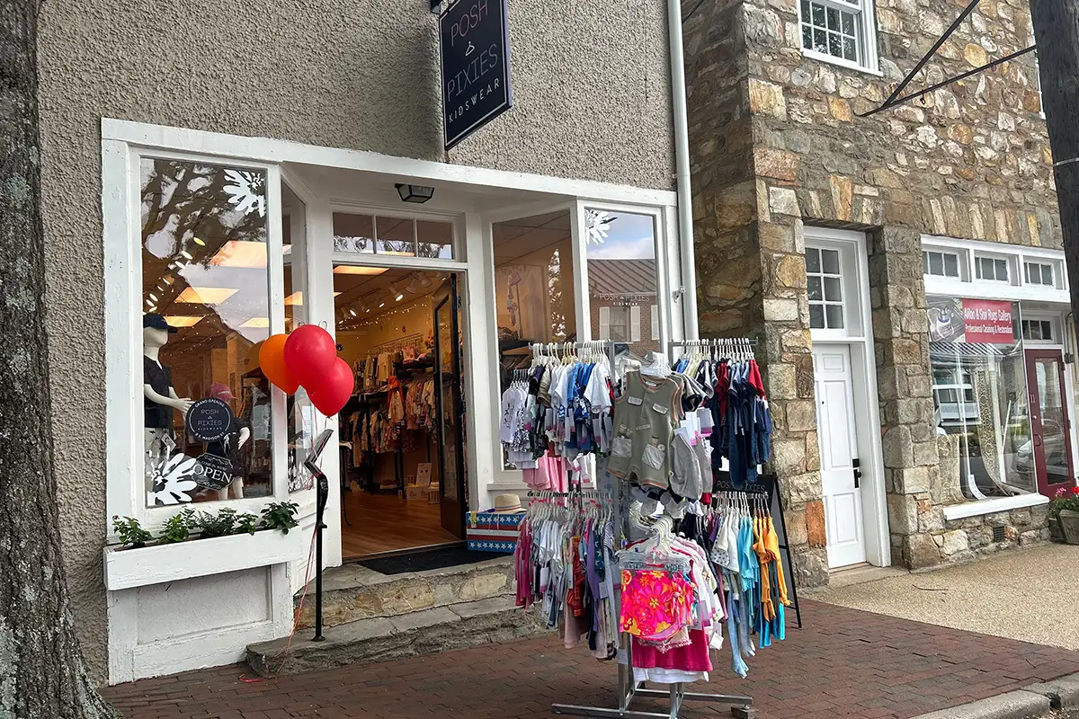 Rack with clothing outside in front of store
