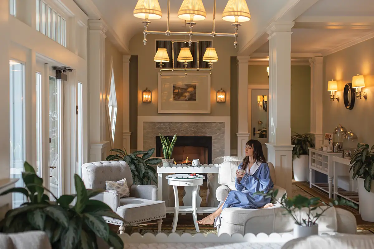 Woman sitting inside Omni Bedford Springs