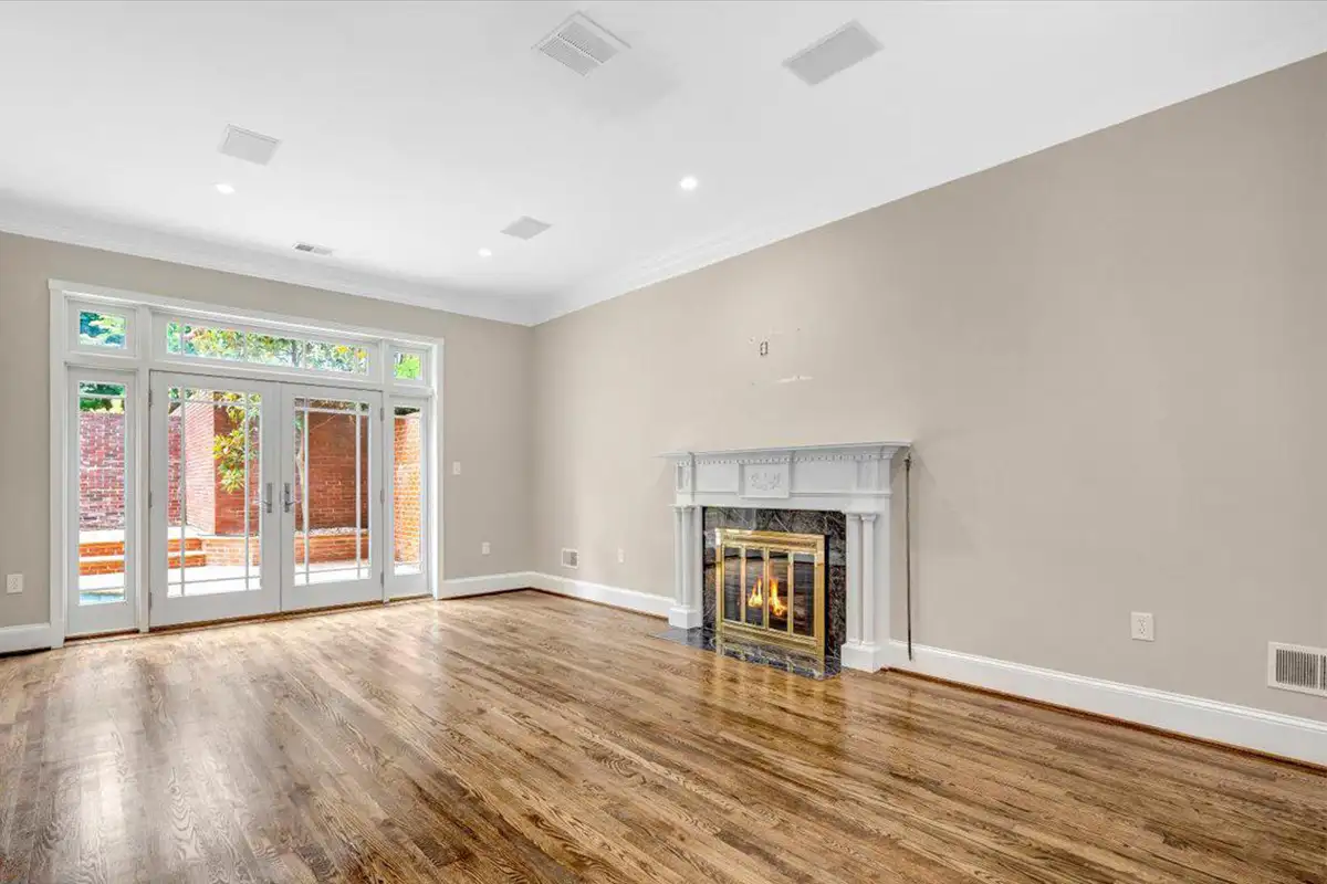 Living room with fireplace and wood floors