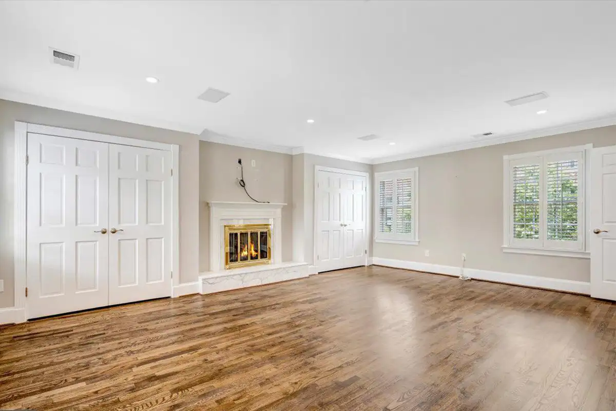 Family room with fireplace and wood floors