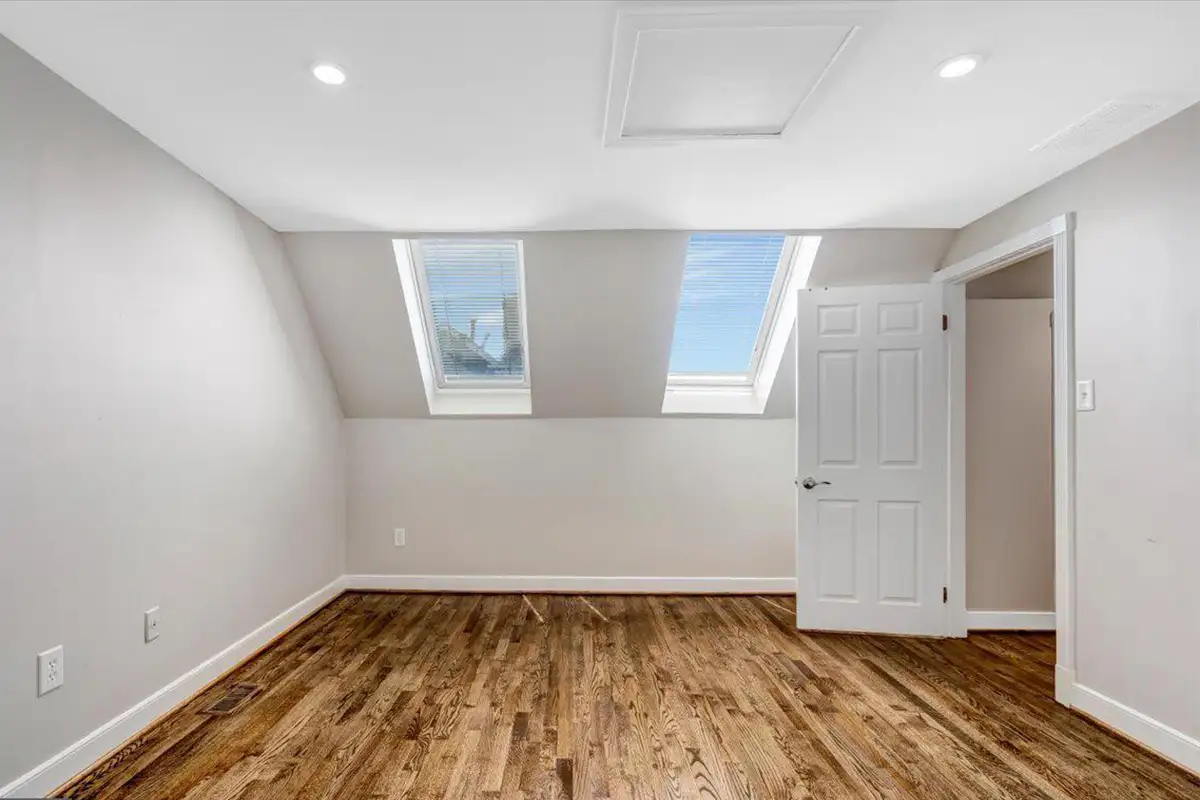Top floor bedroom with skylight windows