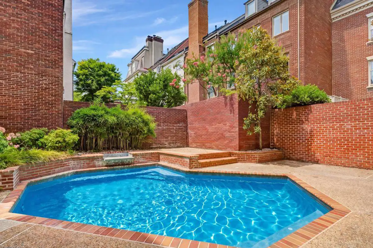 Backyard with in-ground pool and patio garden