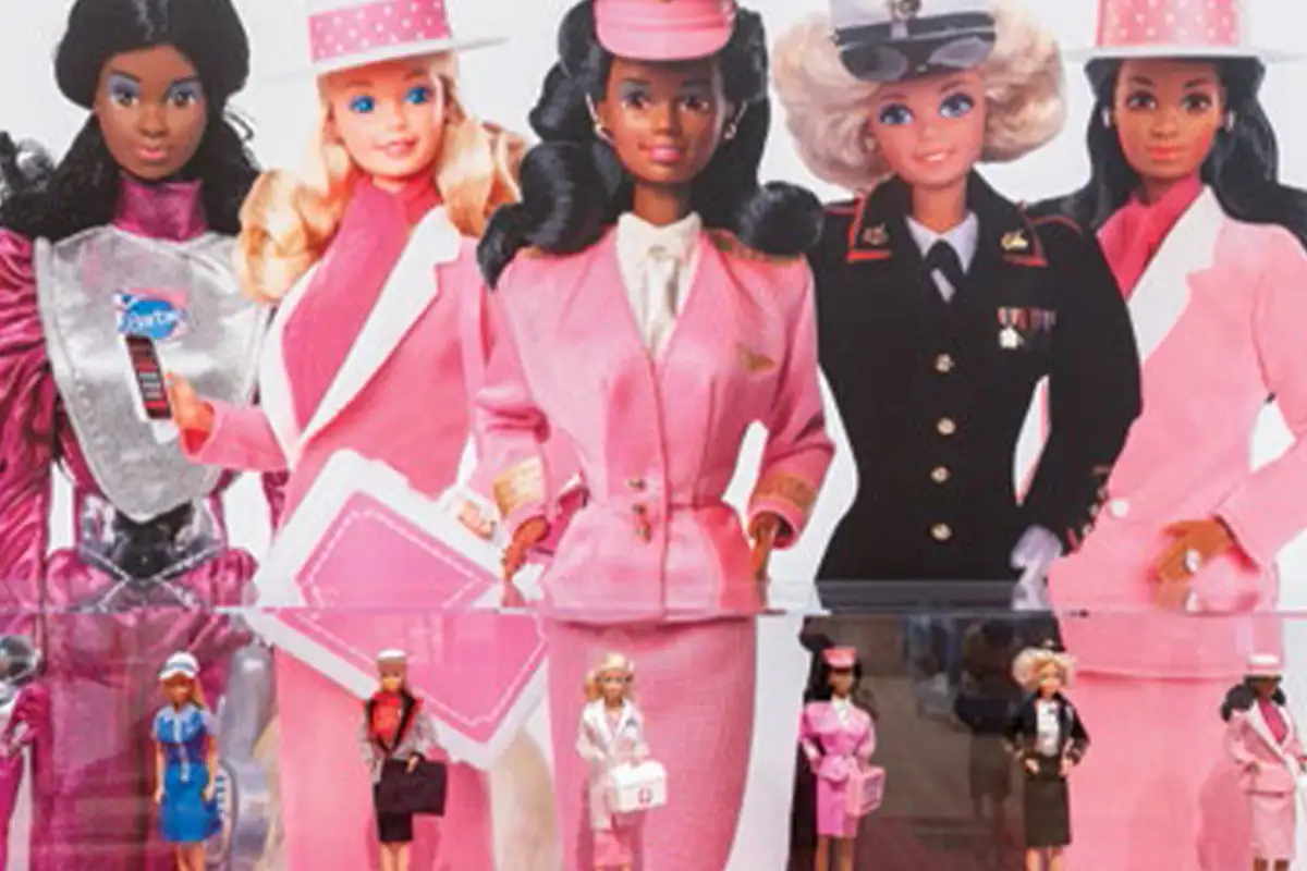 a collection of Barbie dolls 